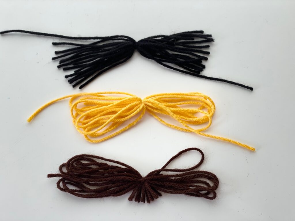 Yarn is used to make the hair for egg dolls, an Easter egg craft. 