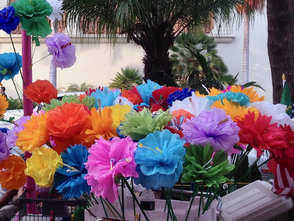 Flower stand. in Santa Barbara, California, displays a variety of Mexican paper flowers. Kids can make some for Cinco de Mayo.