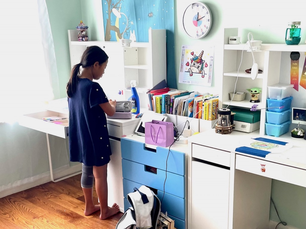 Child sends progress shots to grandma while cleaning her room to ensure she stays committed to the effort.