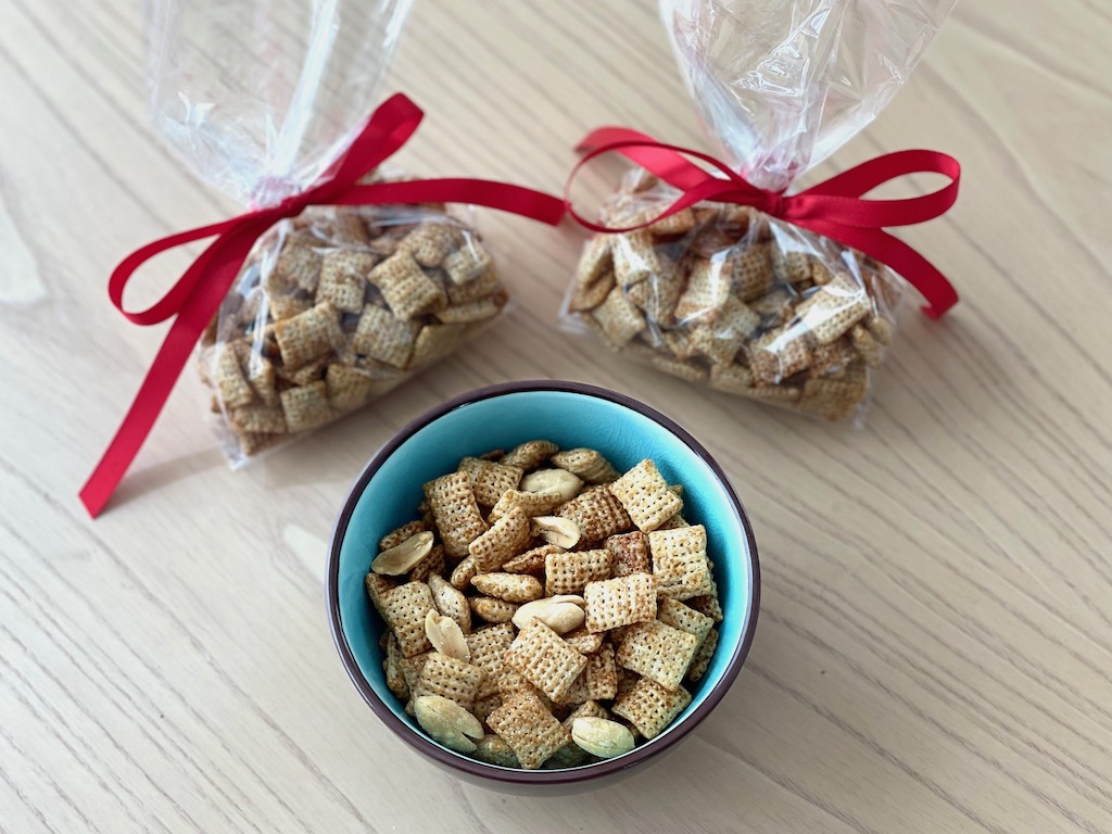 Kakimochi made from rice cereal is bagged for school lunch. The peanut version, in a bowl, is for home consumption, since peanuts aren't allowed in most schools.