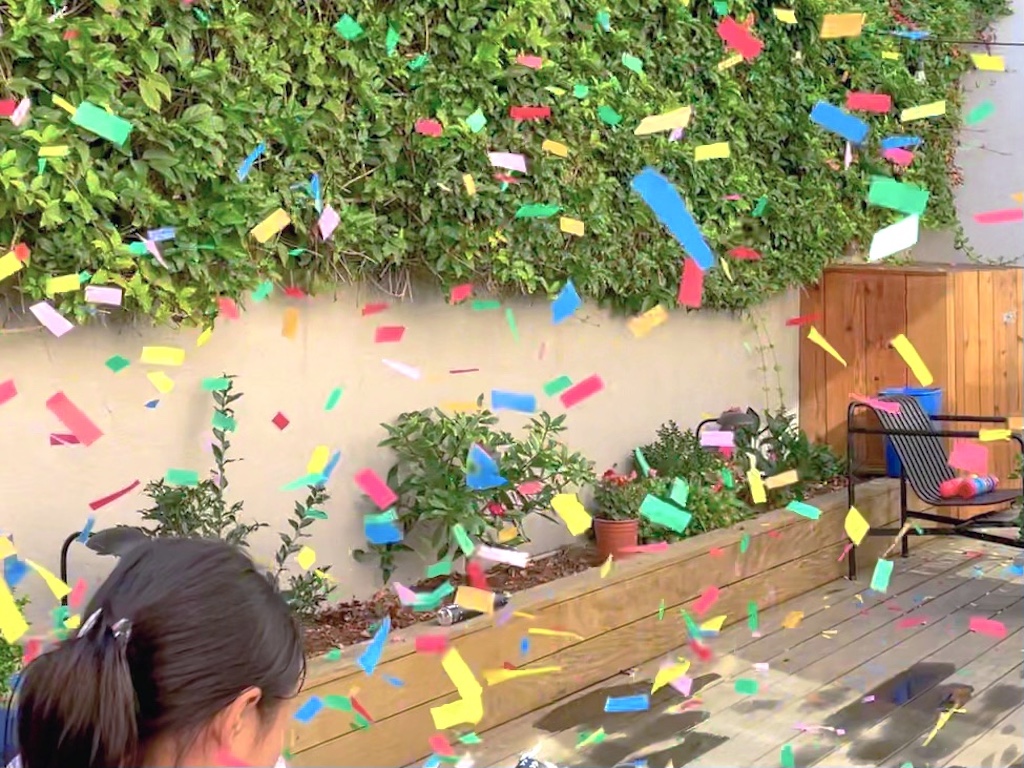 The end to an afternoon of fun and games: confetti shot from a confetti cannon delights kids and adults.