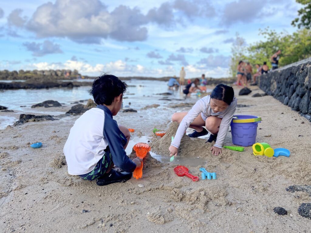 Children playing on a beach.