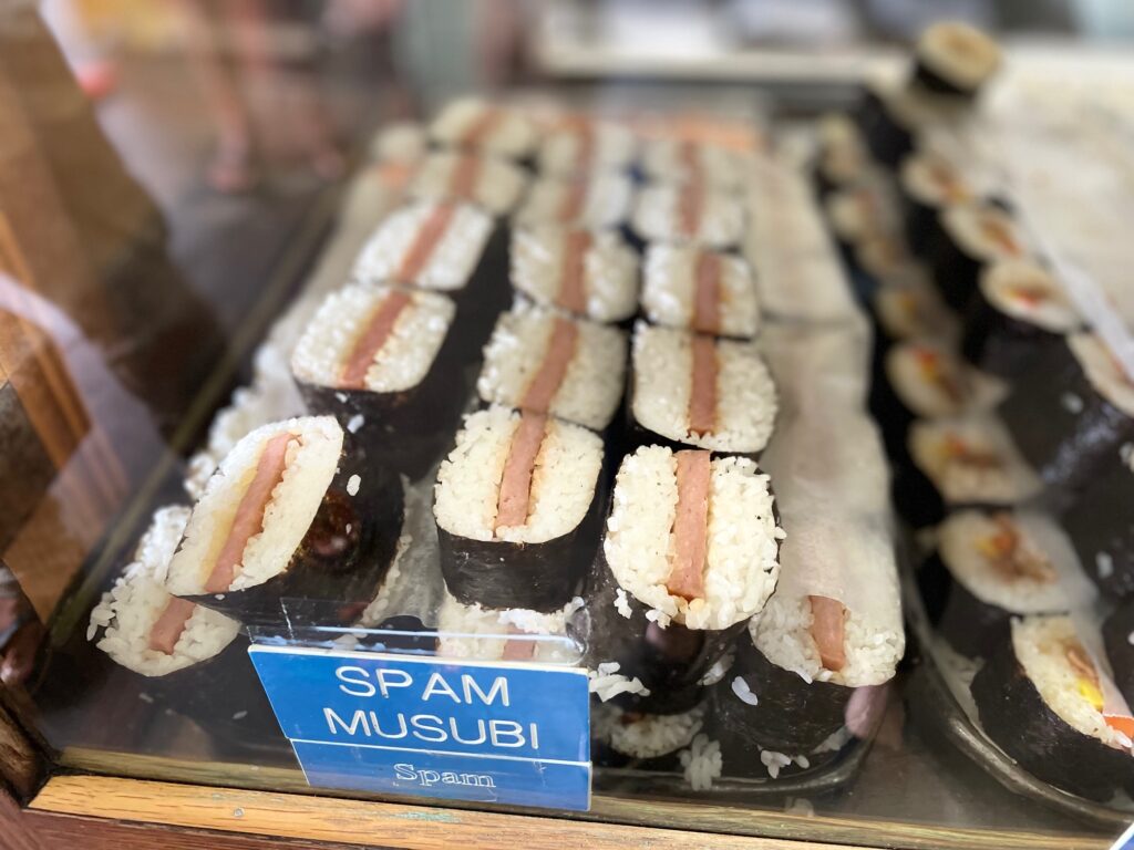 Spam Musubi, a hand-held snack with rice and Spam, encased in nori is ready for purchase at a Japanese delicatessen in Hawaii.