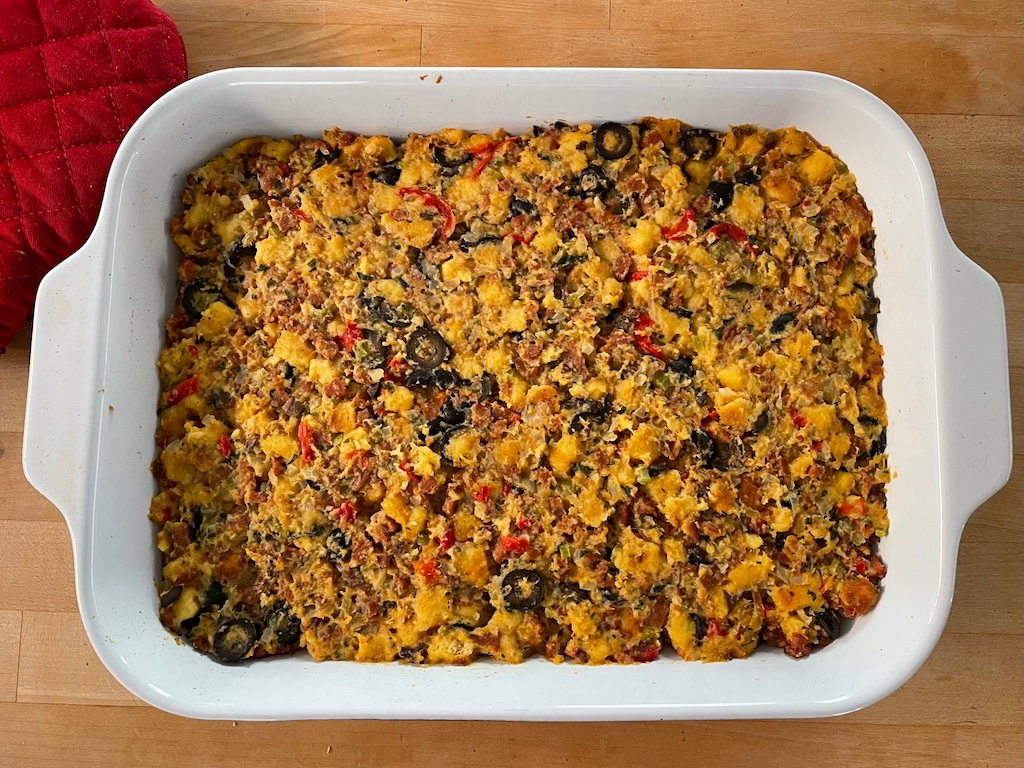 The stuffing right from the oven shows how colorful it is with olives and pimentos.