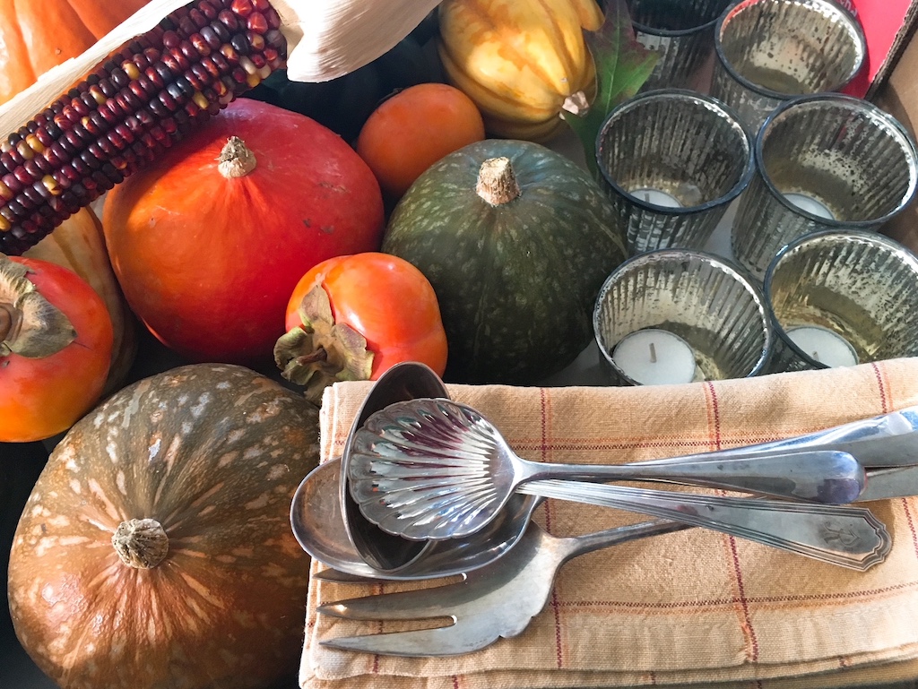 Set a staging area for all the elements you'll need to set the Thanksgiving table.