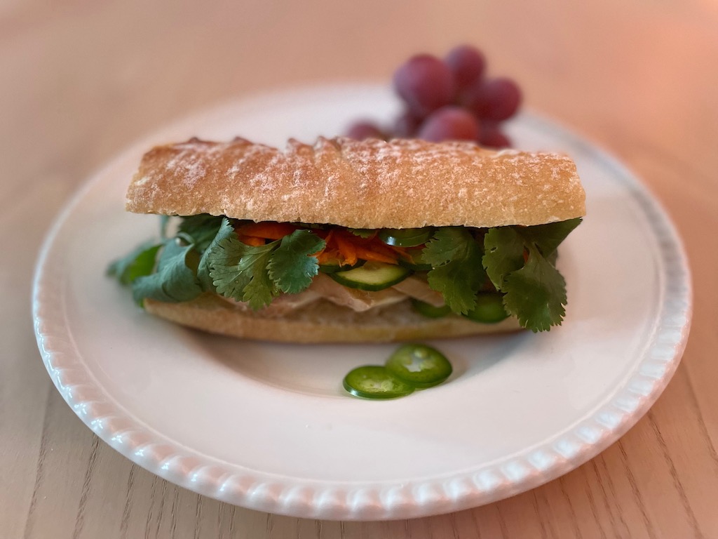 Turkey Vietnamese banh mi sandwich, filled with pickled vegetables, cucumber slices, and cilantro, is a nice departure from the heavy Thanksgiving feast.