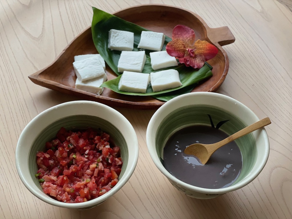 The accompaniments: haupia for dessert, lomi salmon as a condiment to the kalua pig, and poi.