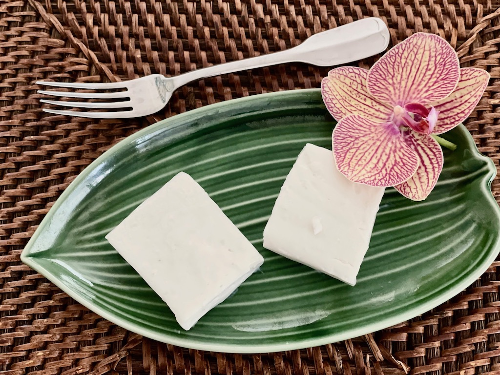 Haupia, coconut pudding cut into squares, is a traditional dessert for a luau.