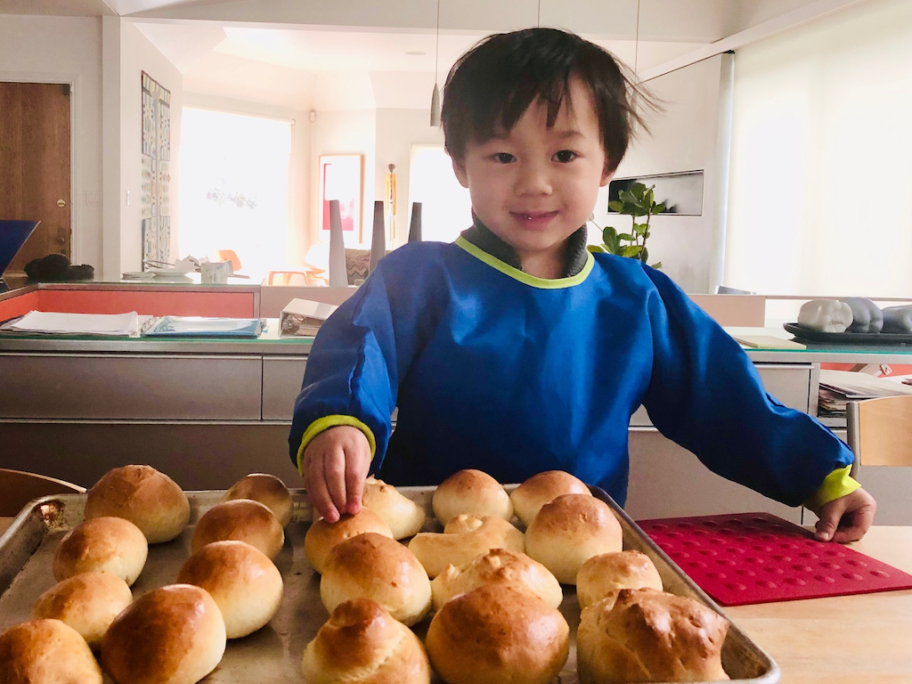 After the dough has been manipulated by the child, you can shape them into balls and bake into rolls.