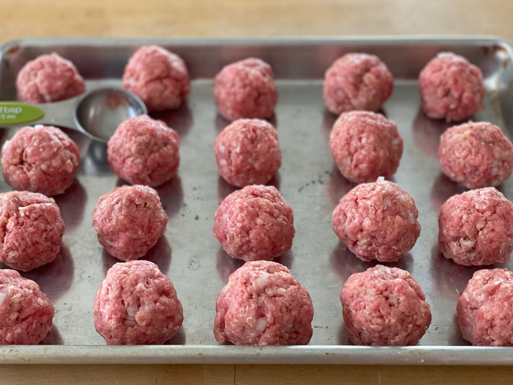 Scoop 2 tablespoons of meat mixture and form into balls; bake about 12 minutes in the oven.