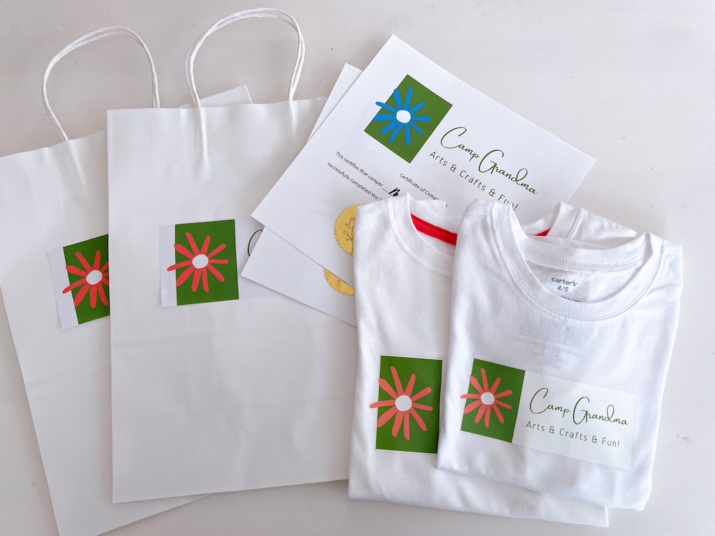 Camp grandma branded: logo on bags, certificates of completion, and T-shirts.