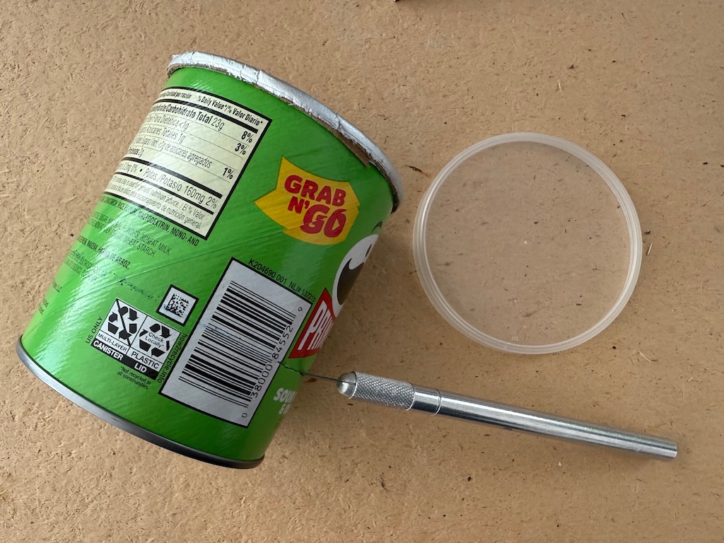 Use an X-Acto knife to cut down the Pringles cardboard can.