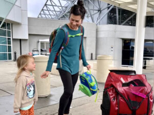 Mother and child leave for the airport after visiting long-distance grandparents.