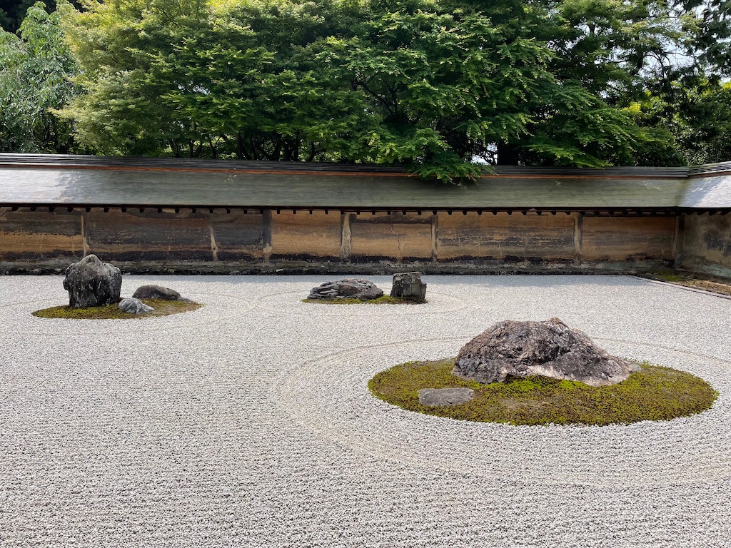 Ryōan-ji garden in Kyoto, Japan, is a "dry landscape" garden; sand raked in geometric patterns facilitates meditation.
