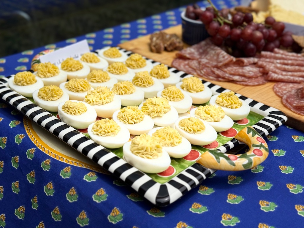 Curry Chutney Deviled eggs sit on a platter. They can be made the day before.