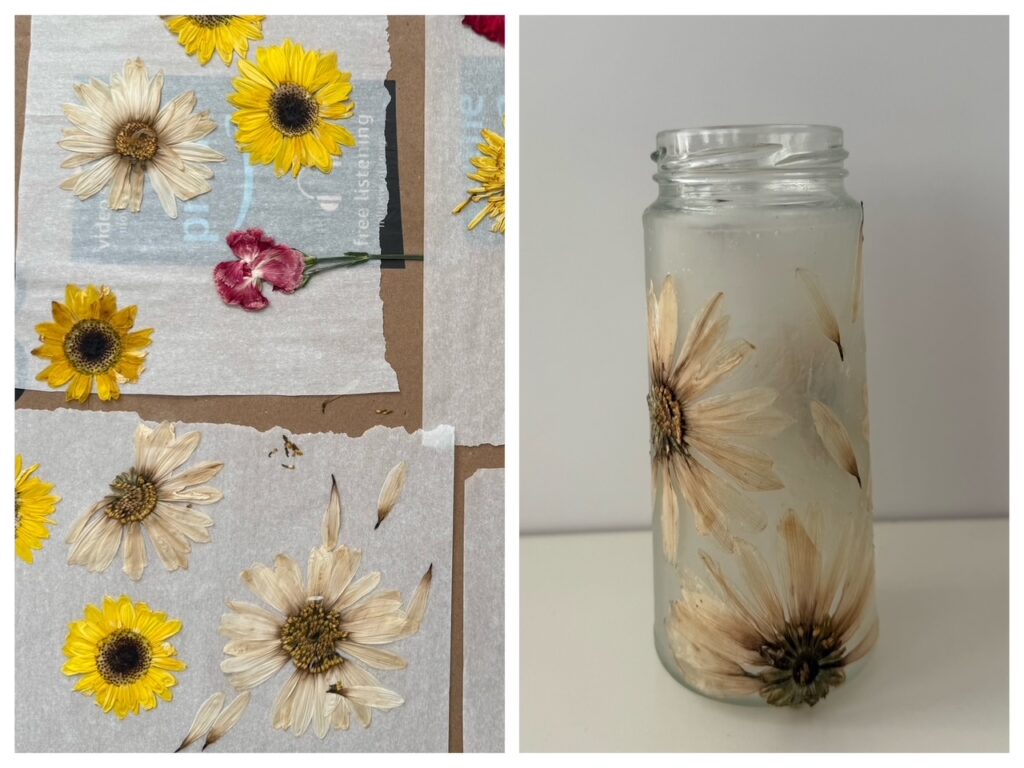 White pressed flowers discolored into beige and broken-off petals were used to make an attractive,  brown vase.