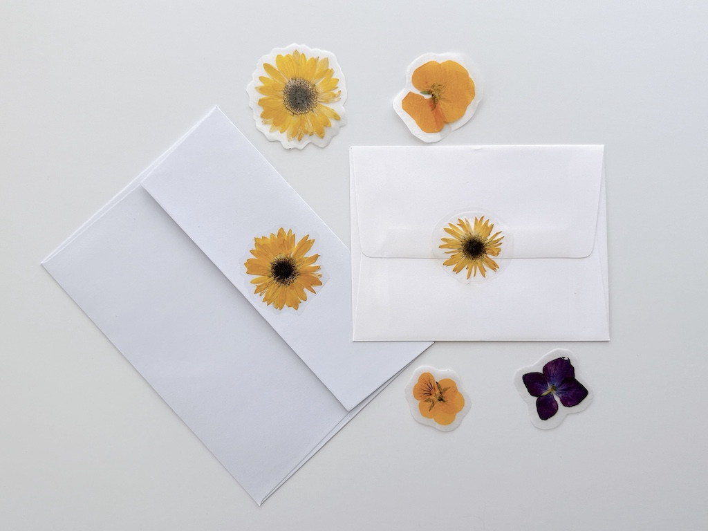 Pressed flower stickers on envelopes and more pressed flower sticker samples.