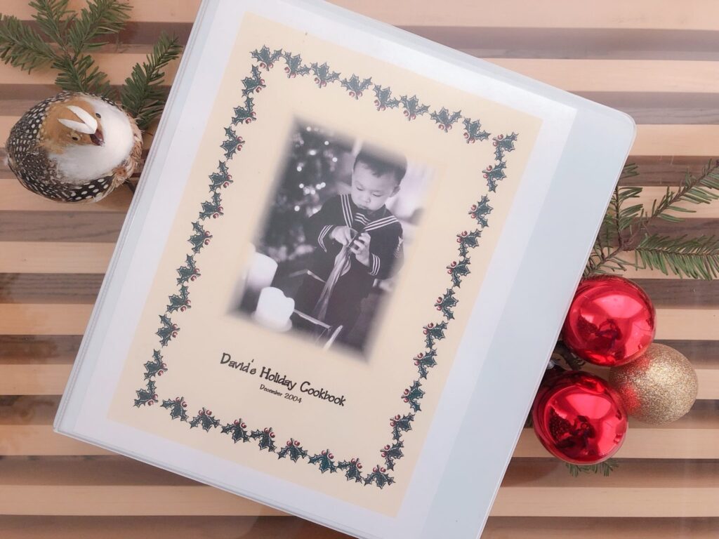 Use an ordinary office three-ring binder to create books for your children to document family traditions. Use photos and recipes to illustrate your book.