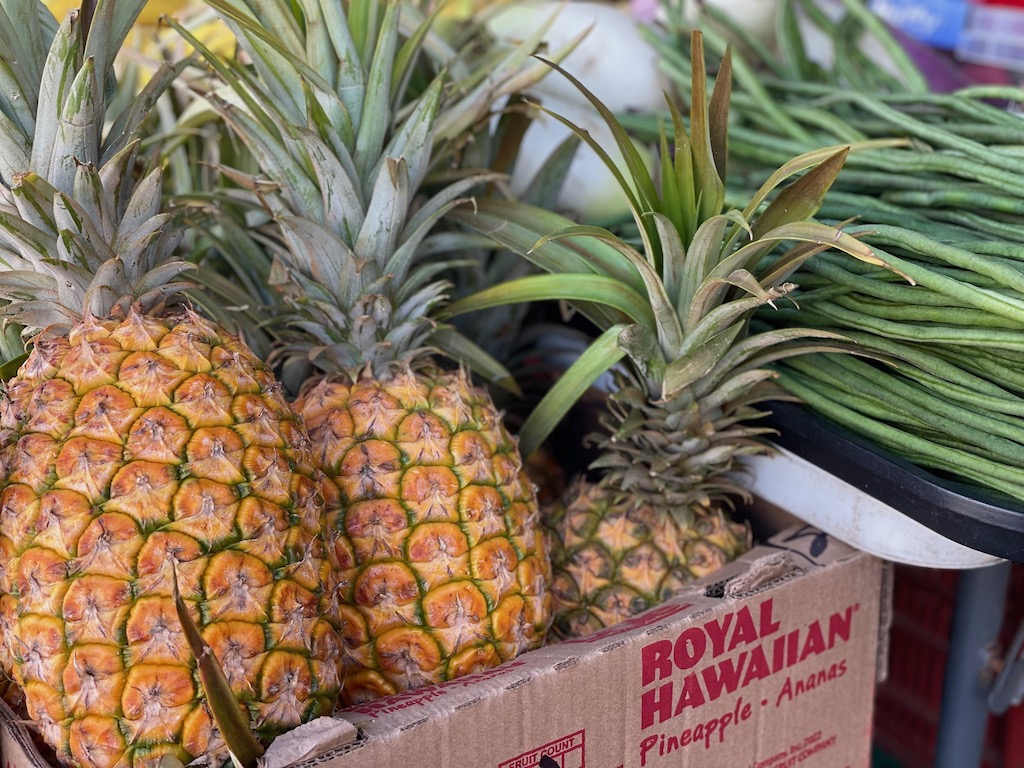 Hawaiian pineapples for sale at the farmers market in Hilo, Hawaii.
