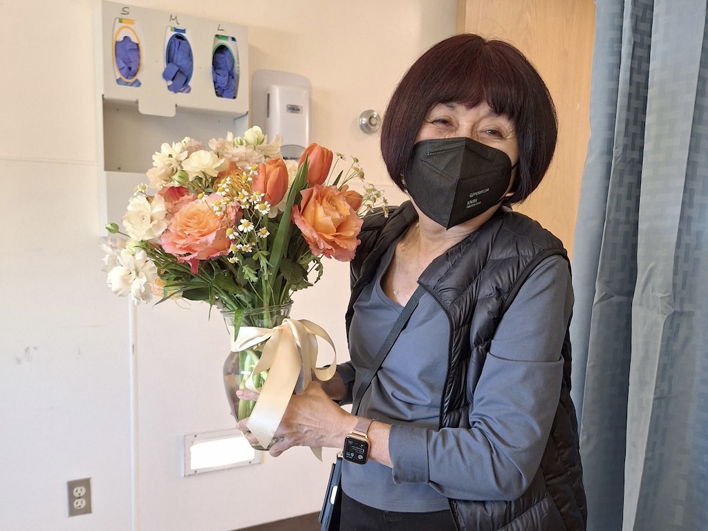 Taking the flower bouquet to the. hospital.