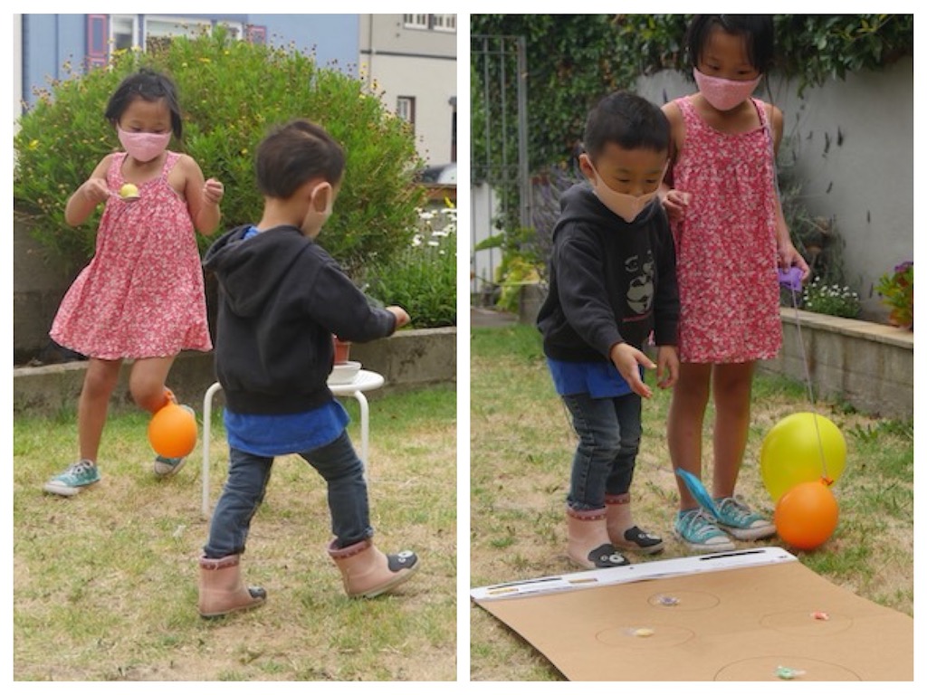 Grandkids at the first summer party playing games, masked for Covid in 2020.
