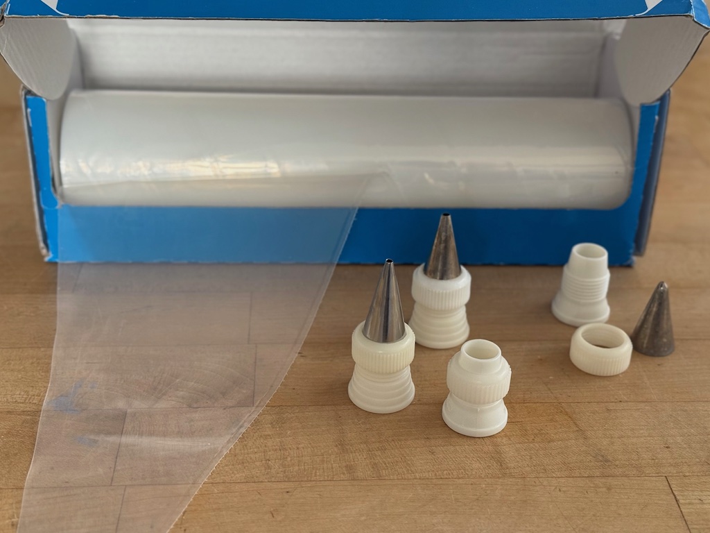 Pastry bags can be purchased by the roll. Make sure you have matching sets for icing tips and couplers