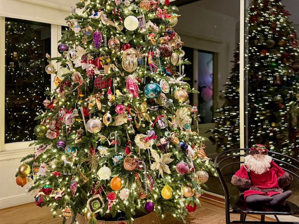Decorated Christmas tree with hundreds of ornaments.