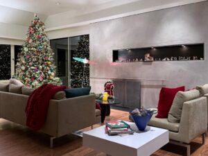 Living room with Christmas tree decorated for Christmas.