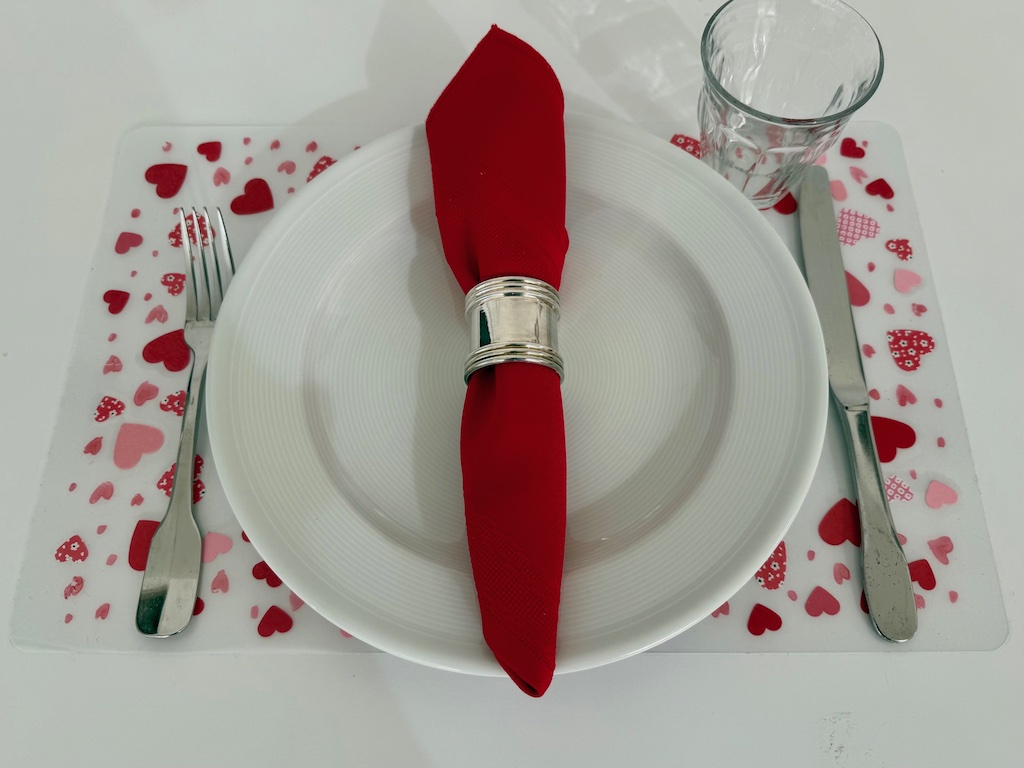 Valentine placemats can be used to set a festive, family Valentine's Day party table.