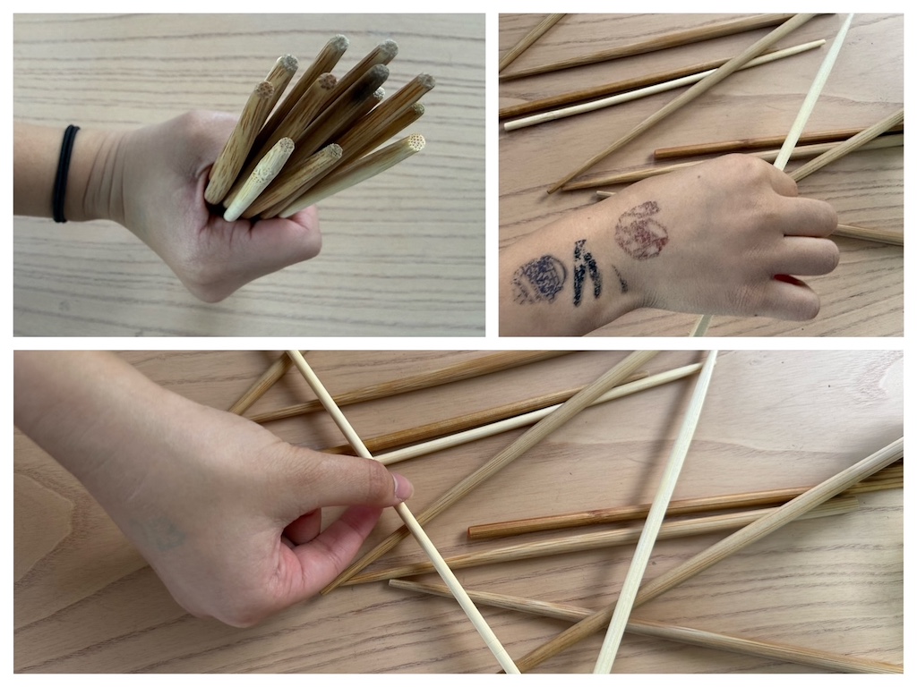 Steps for the pick-up sticks chopstick game: gather all the chopsticks, let them fall in a heap, then pick up chopsticks, one at a time, without disturbing the pile.