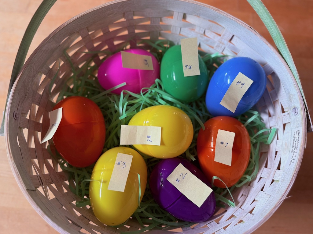 Plastic eggs are numbered with Post-its in the order that they will be found.