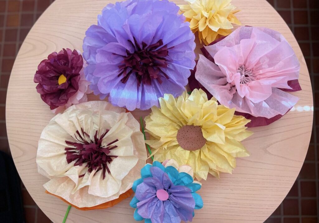 Paper flowers in various sizes and colors are a good way to banish winter doldrums.